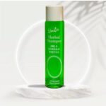 Herbal shampoo bottle with natural Amla ingredients for healthy scalp and hair care.
